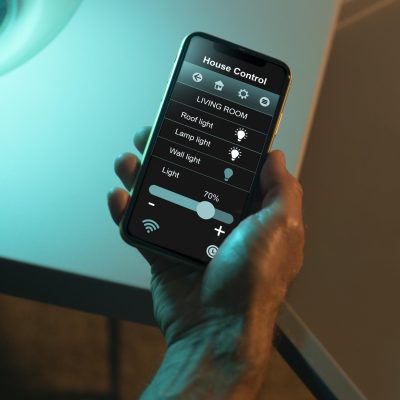 man-using-smartphone-his-automated-home