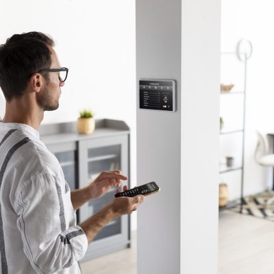 person-using-smartphone-his-automated-home